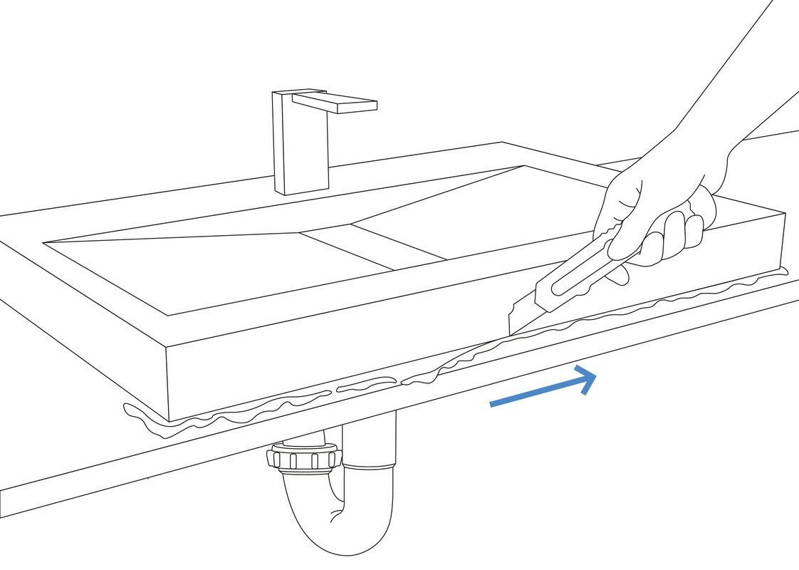 Removing the Old Sink Step 5 Uprooting of any Caulk or Sealant (web)
