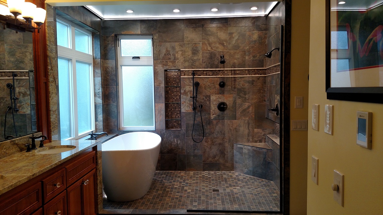 Frameless Shower Door and Aquatica Luna Freestanding Solid Surface Bathtub
