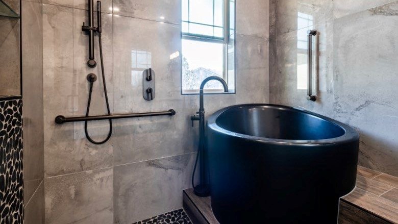 true ofuro mini black freestanding stone japanese soaking bathtub photo1678346129 1